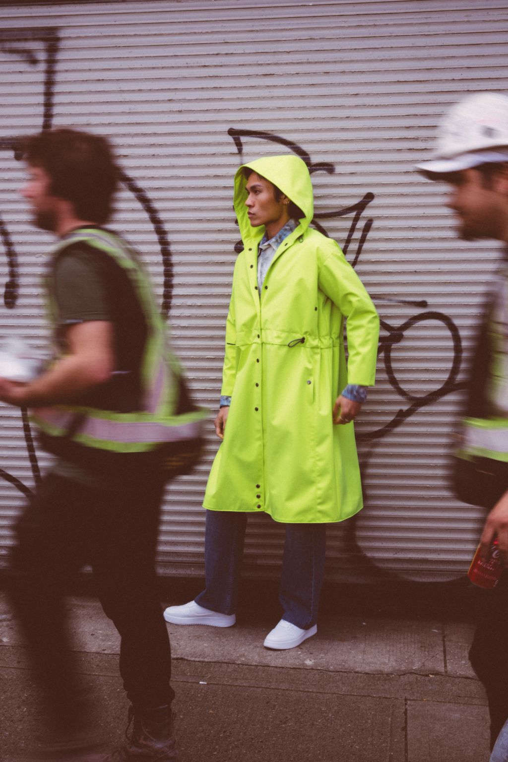 Long City Coat by September Archive. Neon Green Rain Coat. Photographed by Trevor Brady.