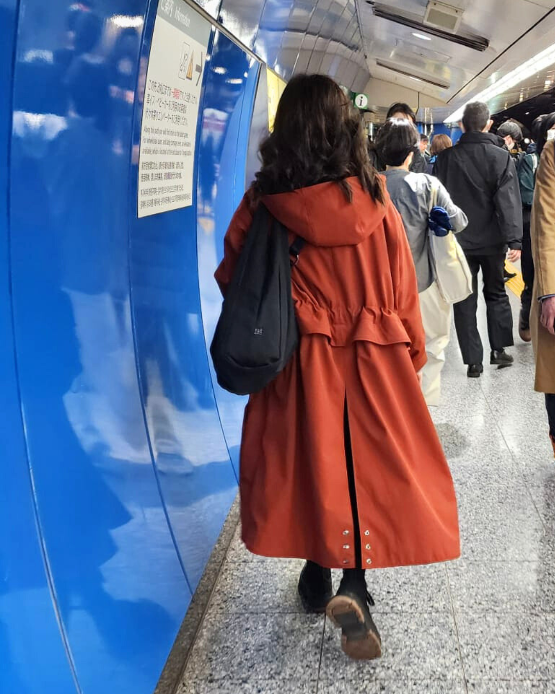 Tearaway City Coat by September Archive. Red rust rain coat. Photographed by Miguel Cuyugan.