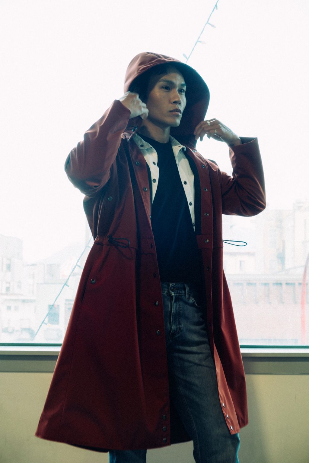 Long City Coat by September Archive. Red Rust Rain Coat. Photographed by Trevor Brady.