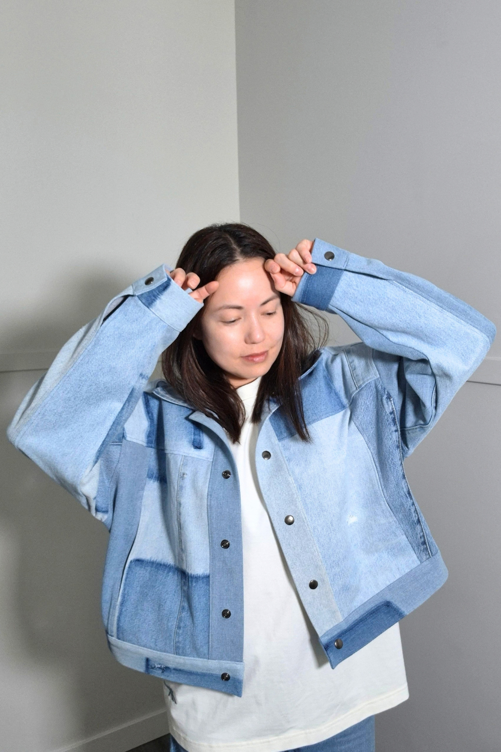 Upcycled denim jacket by September Archive Apparel. Canadian made denim jacket. One of a kind cropped denim jacket made in Vancouver, Canada. Photographed by Sheila Wong.