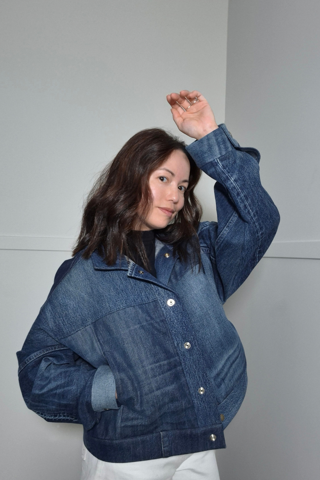 Upcycled denim jacket by September Archive Apparel. Canadian made denim jacket. One of a kind cropped denim jacket made in Vancouver, Canada. Photographed by Sheila Wong.