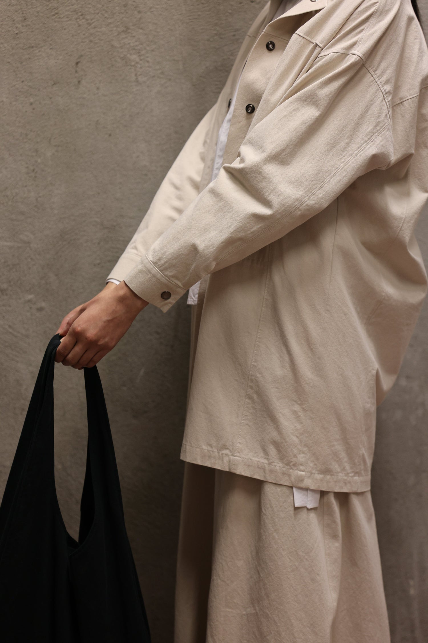 Women wearing organic cotton jacket, pants and tote bag. Featuring Atelier Jacket, Paper Bag Atelier Pant and Atelier Tote by September Archive. Photo taken by Karin Hatch.