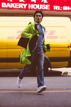 Long City Coat by September Archive. Neon Green Rain Coat. Photographed by Trevor Brady.