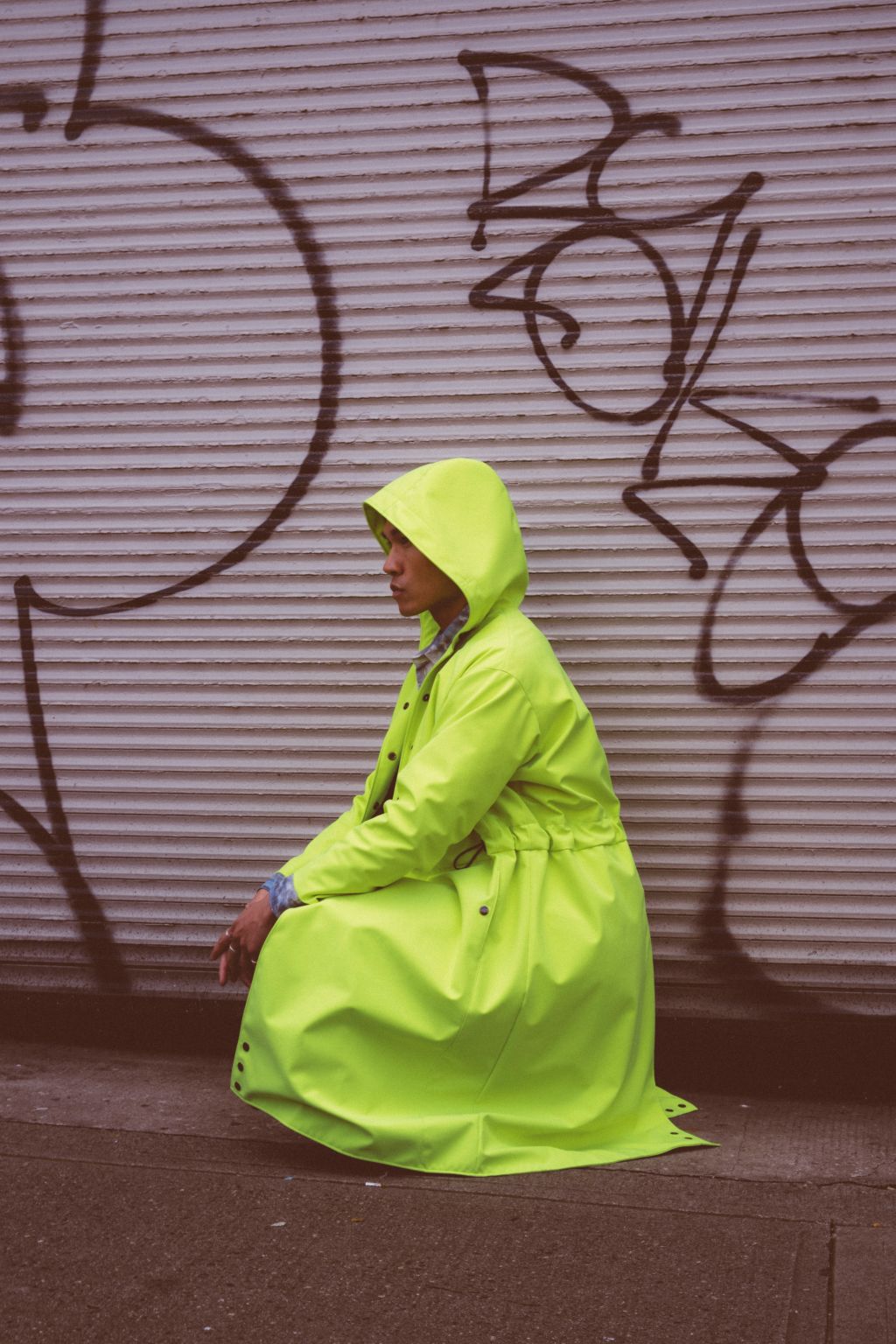 Long City Coat by September Archive. Neon Green Rain Coat. Photographed by Trevor Brady.