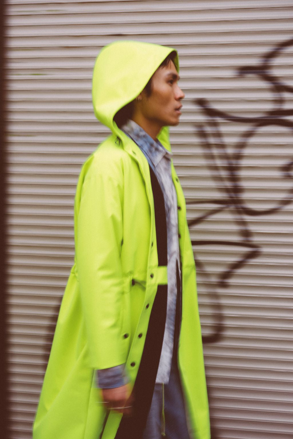 Long City Coat by September Archive. Neon Green Rain Coat. Photographed by Trevor Brady.