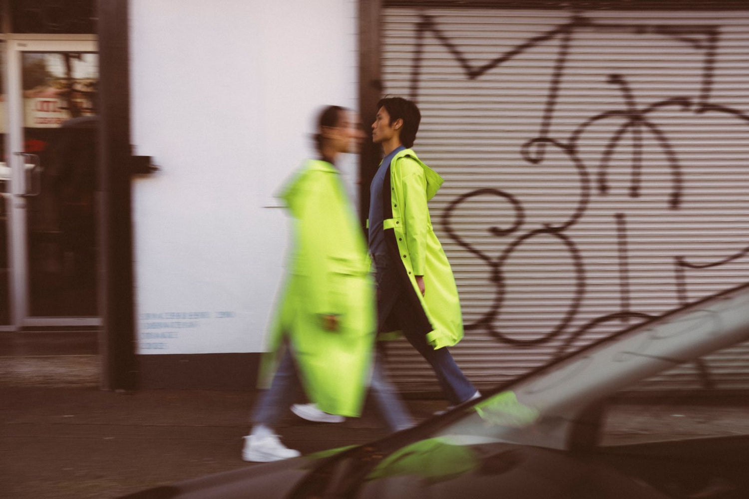 City Coats by September Archive. Neon green rain coats. Photographed by Trevor Brady.
