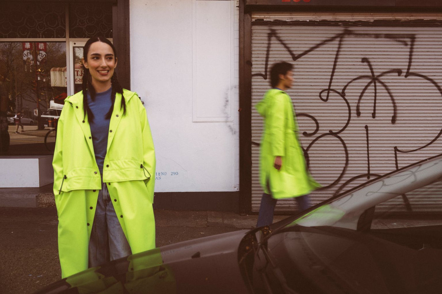 Neon green City Coats by September Archive. Unisex rain jackets. Photographed by Trevor Brady.