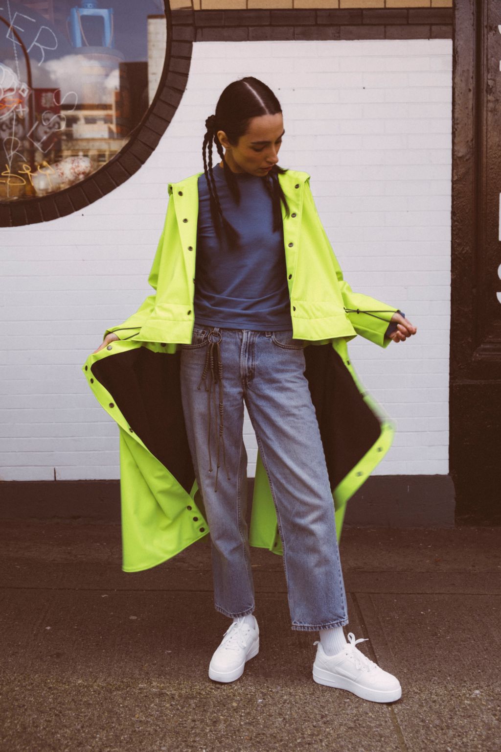Tearaway City Coat by September Archive. Neon green rain coat. Photographed by Trevor Brady.
