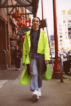 Tearaway City Coat by September Archive. Neon green rain coat. Photographed by Trevor Brady.