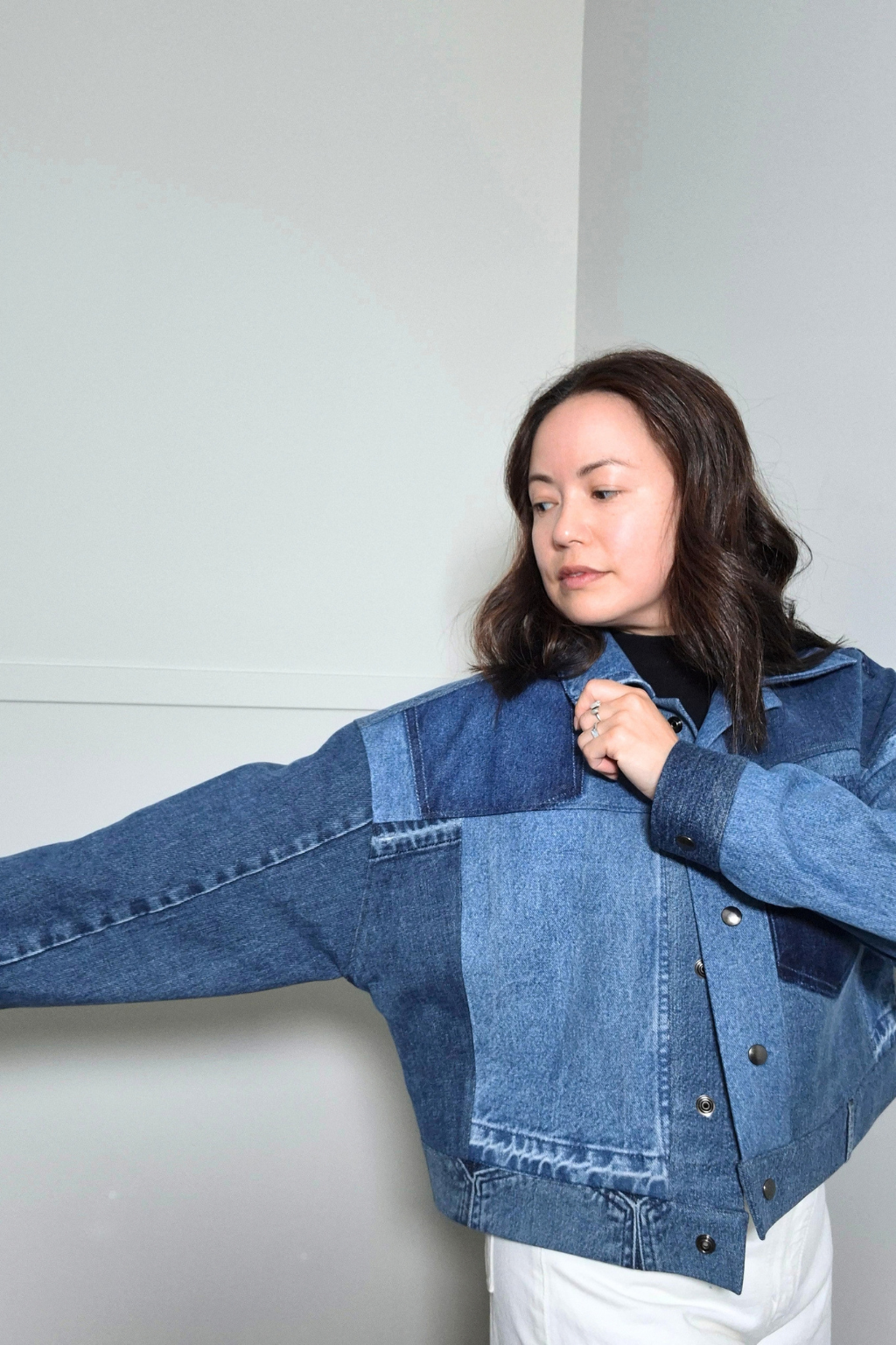 Upcycled denim jacket by September Archive Apparel. Canadian made denim jacket. One of a kind cropped denim jacket made in Vancouver, Canada. Photographed by Sheila Wong. 