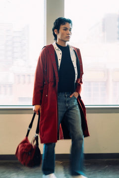 Long City Coat by September Archive. Red Rust Rain Coat. Photographed by Trevor Brady.
