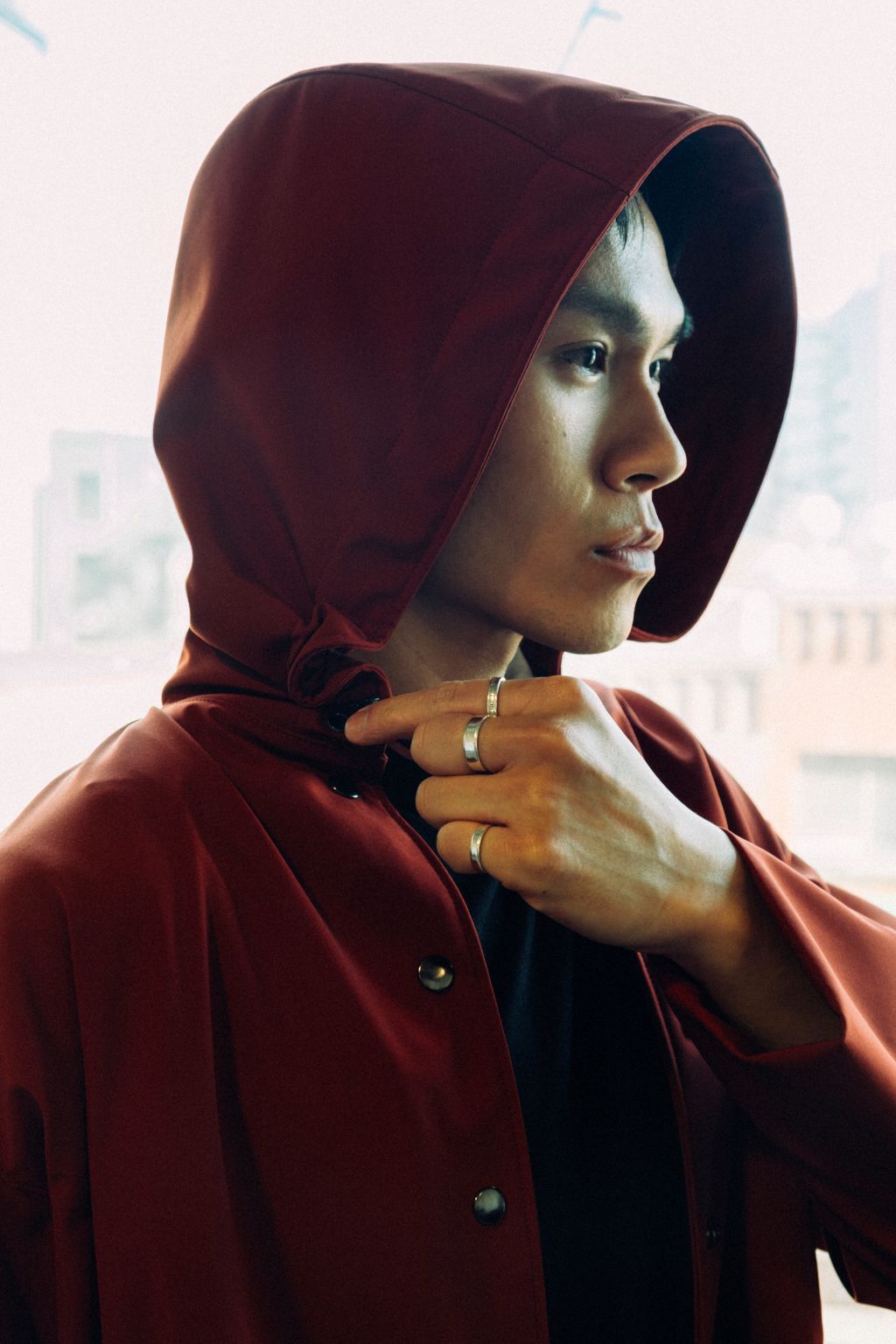 Long City Coat by September Archive. Red Rust Rain Coat. Photographed by Trevor Brady.