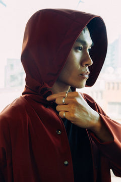 Long City Coat by September Archive. Red Rust Rain Coat. Photographed by Trevor Brady.