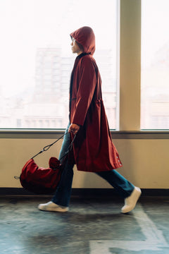 Long City Coat by September Archive. Red Rust Rain Coat. Photographed by Trevor Brady.