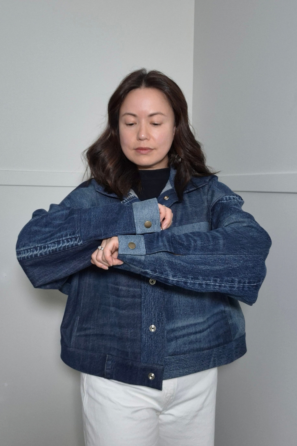 Upcycled denim jacket by September Archive Apparel. Canadian made denim jacket. One of a kind cropped denim jacket made in Vancouver, Canada. Photographed by Sheila Wong. 