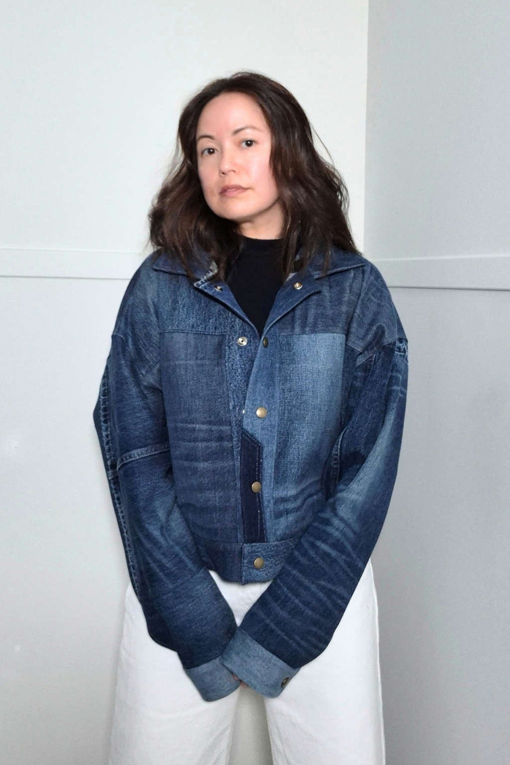 Upcycled denim jacket by September Archive Apparel. Canadian made denim jacket. One of a kind cropped denim jacket made in Vancouver, Canada. Photographed by Sheila Wong. 